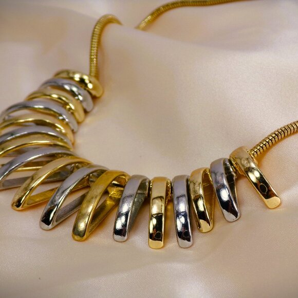 Silver and gold necklace with dome shape metal links attached to a snake chain - Picture 2 of 8